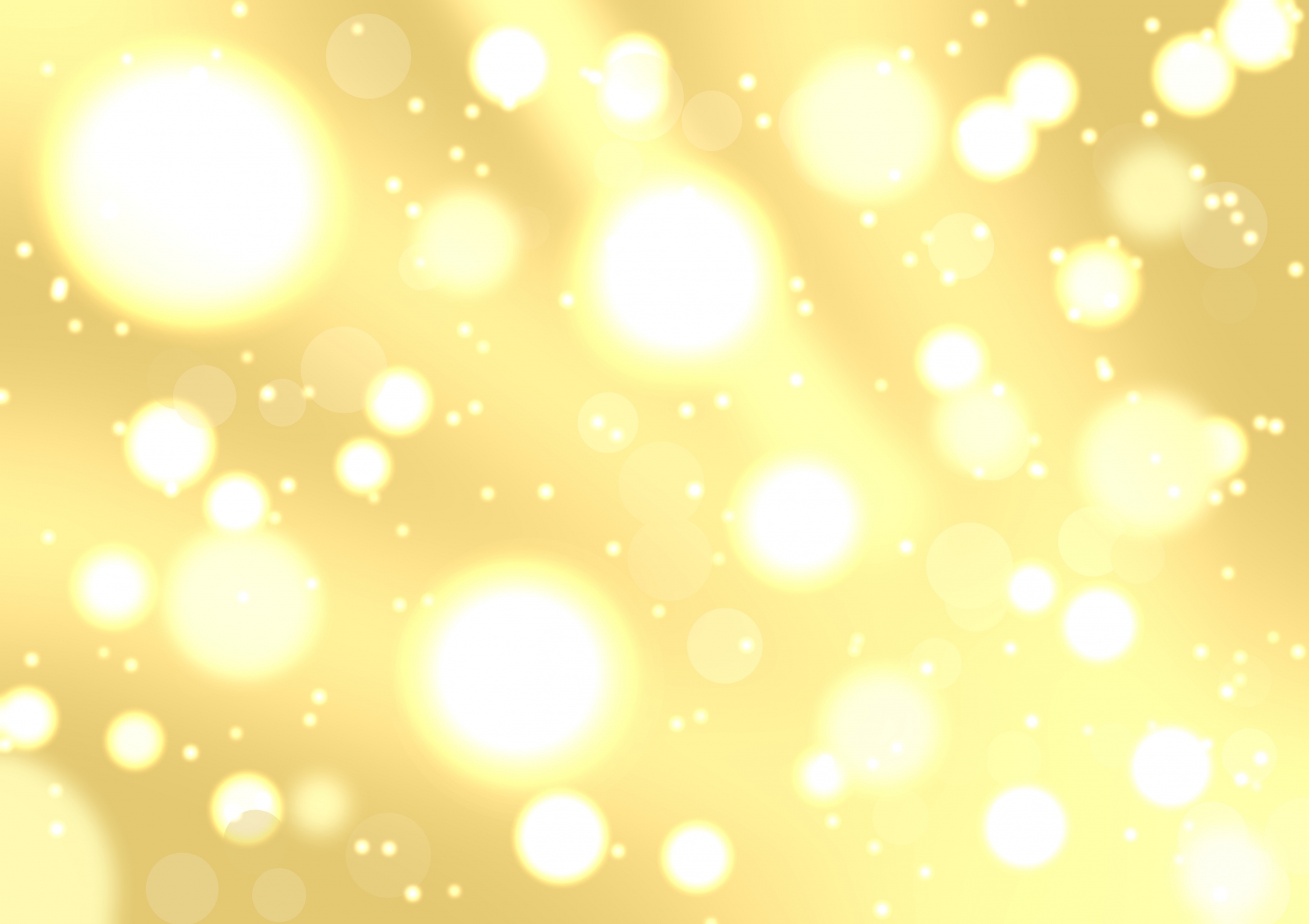 金色の光がやわらかく輝く背景。豊かさや金運アップをイメージした抽象的な写真