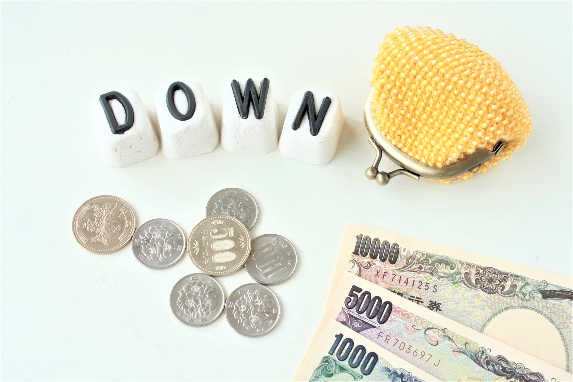 財布に入れてはいけないものと金運が下がる習慣の解説