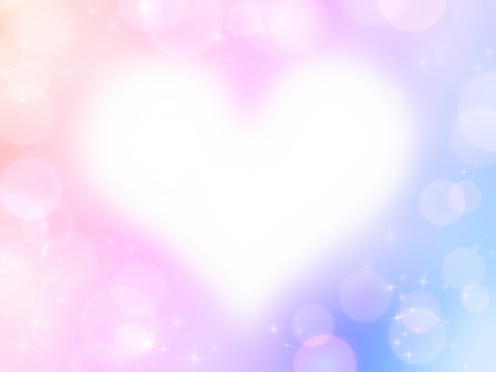 淡いピンクとブルーの光が重なり、優しい雰囲気でハートが浮かぶ背景画像